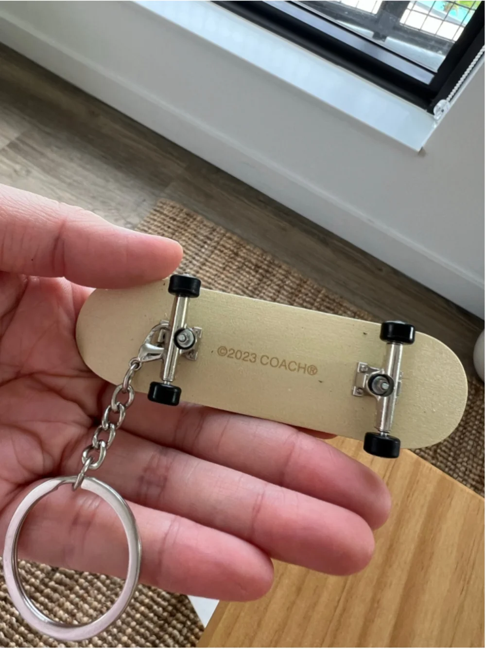 RARE Coach 2023 Limited Yellow Finger Skateboard Graffiti Keychain Sanya Popup